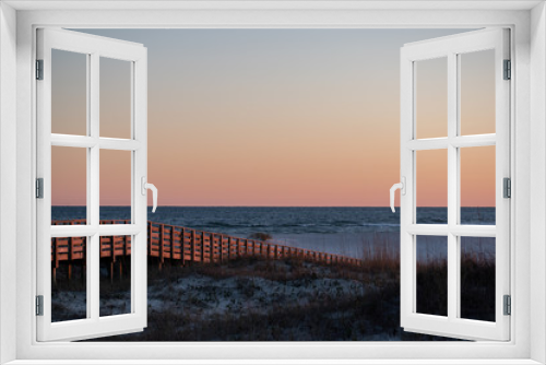 Fototapeta Naklejka Na Ścianę Okno 3D - beach boardwalk sunset glow