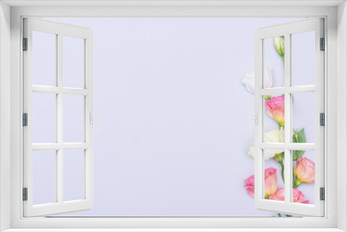 Fototapeta Naklejka Na Ścianę Okno 3D - Tender white and pink eustoma flowers on gray background, flat lay