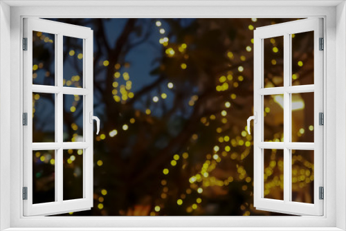 Fototapeta Naklejka Na Ścianę Okno 3D - Golden backlight bokeh On the night tree silhouette background