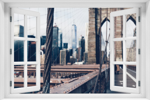 Fototapeta Naklejka Na Ścianę Okno 3D - Details of the Brooklyn Bridge in New York City, USA. Toned in cooler color image