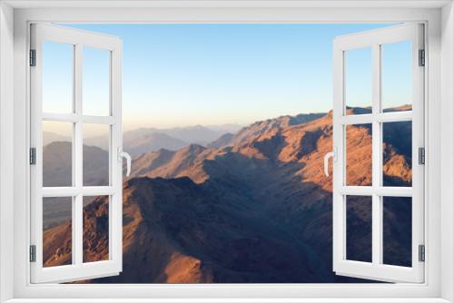 Fototapeta Naklejka Na Ścianę Okno 3D - View from the mountain of Moses, a beautiful sunrise in the mountains of Egypt