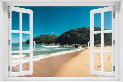Fototapeta Naklejka Na Ścianę Okno 3D - Beautiful Parnaioca beach with crystal blue water, rocks and clear sand, deserted tropical beach on the sunny coast of Rio de Janeiro, Ilha Grande in the city of Agnra dos Reis, Brazil