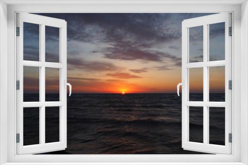 Fototapeta Naklejka Na Ścianę Okno 3D - The sun has just risen above the sea