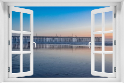 Fototapeta Naklejka Na Ścianę Okno 3D - sunset over the wooden pier of Pismo Beach California