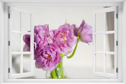 Fototapeta Naklejka Na Ścianę Okno 3D - Spring flowers. Bouquet of purple tulips on white background.