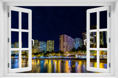 Fototapeta Naklejka Na Ścianę Okno 3D - Fantastic view of tropical city at night in Honolulu, Hawaii, USA