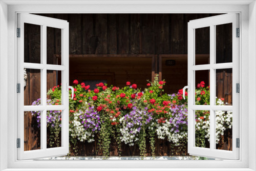 Fototapeta Naklejka Na Ścianę Okno 3D - Fenster mit Blumenschmuck