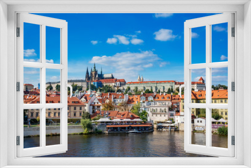 Fototapeta Naklejka Na Ścianę Okno 3D - View of the city and the Vltava River in Prague, the capital of the Czech Republic.