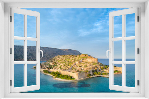 Fototapeta Naklejka Na Ścianę Okno 3D - Aerial view of the island of Spinalonga with calm sea. Here were isolated lepers, humans with the Hansen's desease, gulf of Elounda, Crete, Greece.