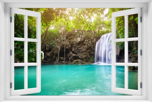 Fototapeta Naklejka Na Ścianę Okno 3D - Waterfall in Tropical forest at Erawan waterfall National Park, Thailand	