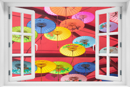 Fototapeta Naklejka Na Ścianę Okno 3D - Colorful oil-paper umbrellas hanging in the air