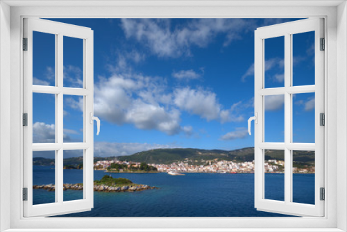 Fototapeta Naklejka Na Ścianę Okno 3D - Skiathos island , the most famous island of Greece is one of the most famous Greek destinations in the whole world, here we see a view of the island from a ship. Famous for its beaches, one of the bes