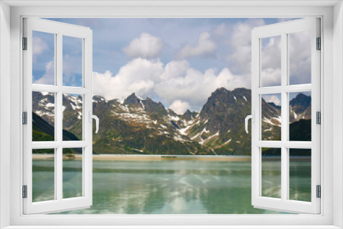 Fototapeta Naklejka Na Ścianę Okno 3D - Silvretta See mit Spiegelung, Bergen und Schnee