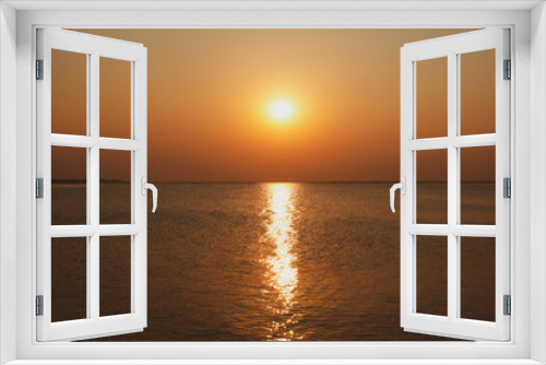 Fototapeta Naklejka Na Ścianę Okno 3D - The sunset on the sea in the summer