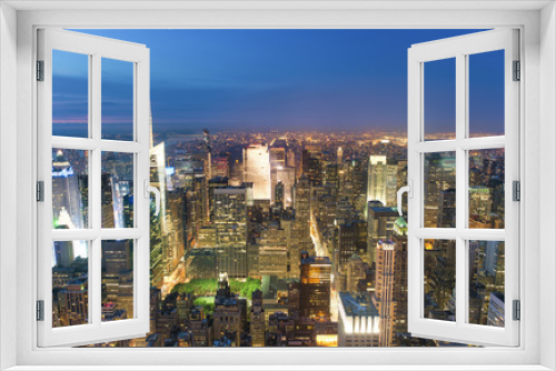 Fototapeta Naklejka Na Ścianę Okno 3D - Night aerial view of Midtown Manhattan skyscrapers from a high viewpoint, New York City, USA