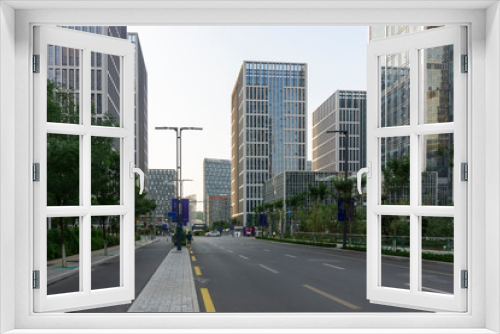 Fototapeta Naklejka Na Ścianę Okno 3D - Urban road and modern office building of Ningbo business district