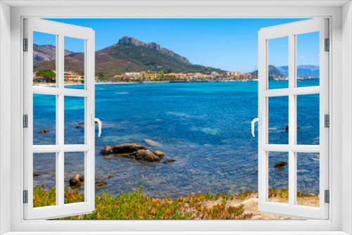 Fototapeta Naklejka Na Ścianę Okno 3D - Golfo Aranci, Sardinia, Italy - Panoramic view of Golfo Aranci harbor and beach - Spiaggia di Golfo Aranci - with Monte Ruju mount at the Tyrrhenian Sea coast