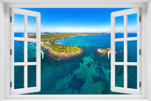Fototapeta Naklejka Na Ścianę Okno 3D - Coastal Resort Scenery of Phu Quoc Island (Nam Nghi of Cua Can Region), Vietnam, a Tourism Destination for Summer Vacation in Southeast Asia, with Tropical Climate and Beautiful Landscape. Aerial View