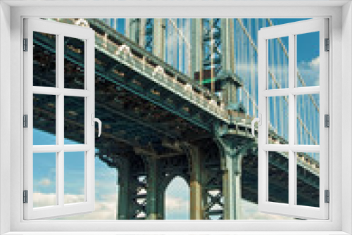 Fototapeta Naklejka Na Ścianę Okno 3D - Manhattan bridge in New York City with beautiful blue sky