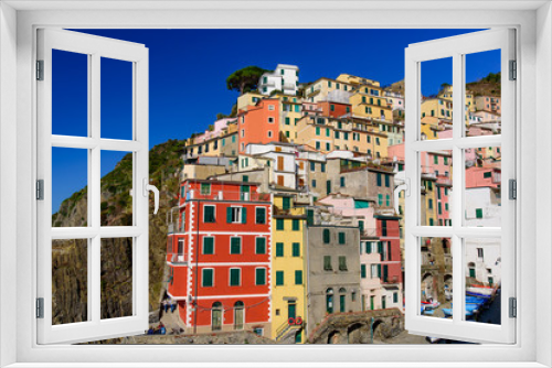 Fototapeta Naklejka Na Ścianę Okno 3D - Riomaggiore, one of the five Mediterranean villages in Cinque Terre, Italy, famous for its colorful houses