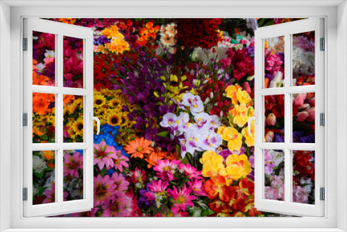 Fototapeta Naklejka Na Ścianę Okno 3D - flower shop counter. Lots of different colors.