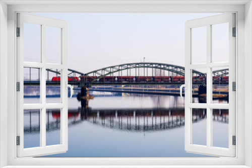 Fototapeta Naklejka Na Ścianę Okno 3D - Eisenbahnbrücke über einen Fluss