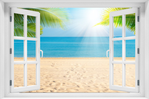 Fototapeta Naklejka Na Ścianę Okno 3D - Tropical sea beach with sand, ocean, palm leaves and blue sky