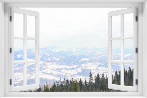 Fototapeta Naklejka Na Ścianę Okno 3D - Beautiful view of conifer forest on snowy winter day