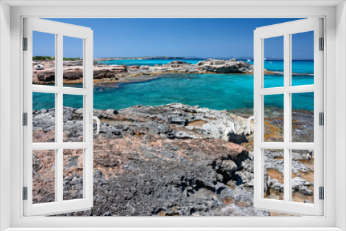Fototapeta Naklejka Na Ścianę Okno 3D - Panoramic view of the rocky coast and the transparent blue waters of Formentera in the Balearic Islands in Spain.