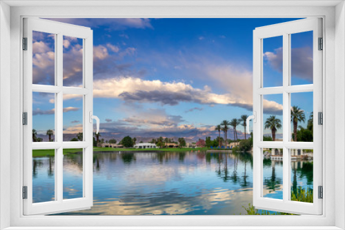 Fototapeta Naklejka Na Ścianę Okno 3D - View of water features on a golf course  in Palm Desert, CA.Palm Desert and Palm Springs are popular golf destinations. 
