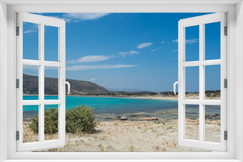 Fototapeta Naklejka Na Ścianę Okno 3D - Beautiful beach with teal blue waters shot at Elafonhsos Island, Greece.