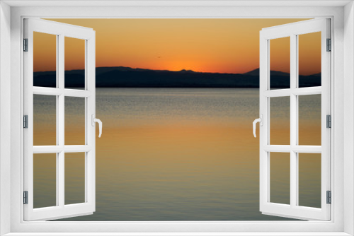 Fototapeta Naklejka Na Ścianę Okno 3D - orange sunset on a lake 