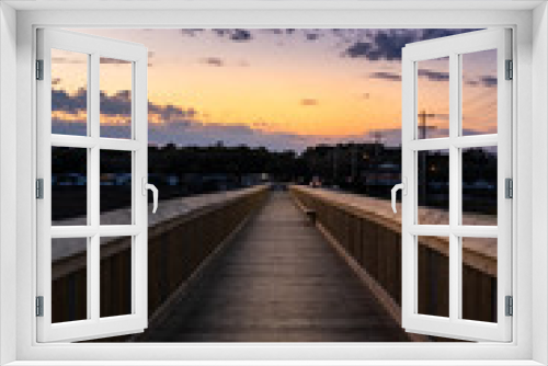 Fototapeta Naklejka Na Ścianę Okno 3D - Walkway at sunset
