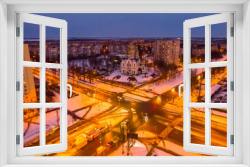 Fototapeta Naklejka Na Ścianę Okno 3D - Aerial city winter view with crossroads and roads, houses, buildings, parks. Helicopter drone shot. Wide Panoramic image. Kharkiv, Ukraine