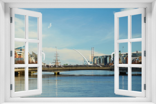 Fototapeta Naklejka Na Ścianę Okno 3D - A view along the quays in Dublin City, Ireland