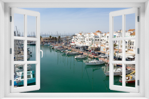 Fototapeta Naklejka Na Ścianę Okno 3D - The harbour of Almerimar Spain on a sunny summer day 