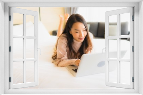 Portrait beautiful young asian woman using laptop for working