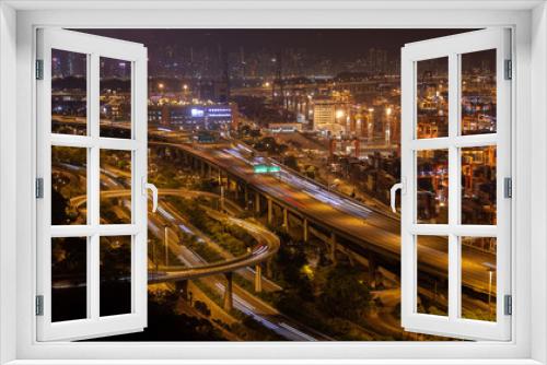 Fototapeta Naklejka Na Ścianę Okno 3D - Container port Hong Kong overpass road with orange illumination