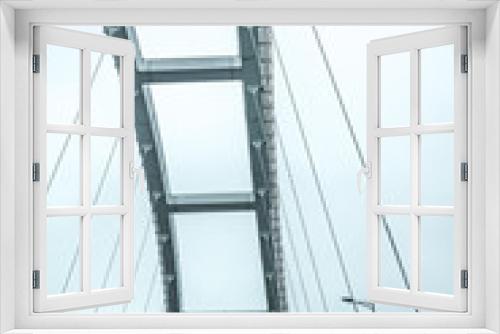 Fototapeta Naklejka Na Ścianę Okno 3D - Steel structures of the Kerch bridge. Bottom view. Black and white image