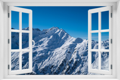 Fototapeta Naklejka Na Ścianę Okno 3D - European winter sports Alps - snowy peaks, mountains and ski slopes with blue skies near St. Anton am Arlberg
