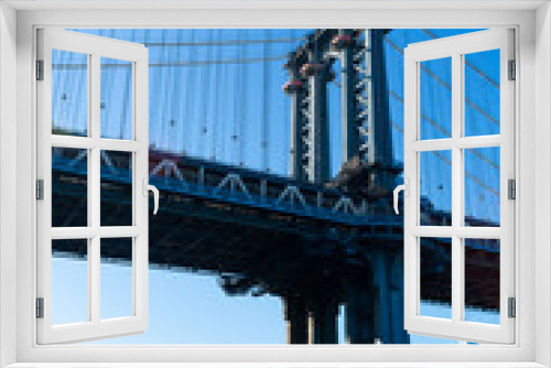 Fototapeta Naklejka Na Ścianę Okno 3D - The Manhattan Bridge along the East River with the Lower Manhattan Skyline in New York City