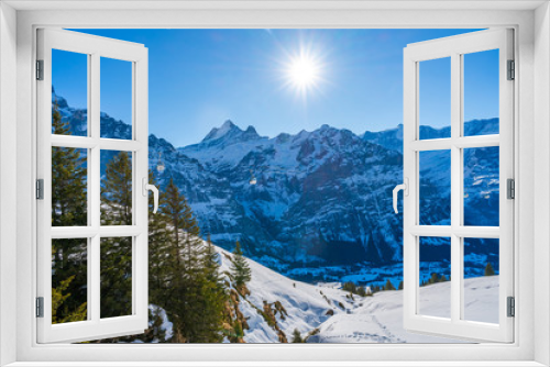 Fototapeta Naklejka Na Ścianę Okno 3D - Winter landscape with snow covered peaks seen from the First mountain in Swiss Alps in Grindelwald ski resort, Switzerland