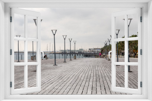 Fototapeta Naklejka Na Ścianę Okno 3D - A wooden pier at he waterfront of Limassol