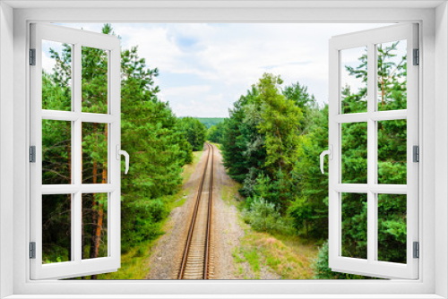 Fototapeta Naklejka Na Ścianę Okno 3D - Old railroad in forest on summer