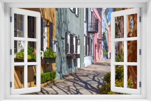 Fototapeta Naklejka Na Ścianę Okno 3D - Rainbow Row in the morning, the name for a series of thirteen colorful historic houses in Charleston, South Carolina. 