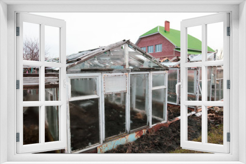 Fototapeta Naklejka Na Ścianę Okno 3D - Old greenhouse in the country