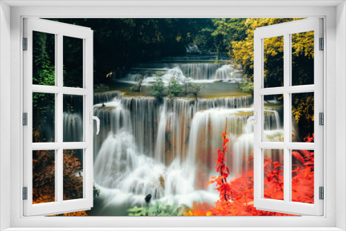 Fototapeta Naklejka Na Ścianę Okno 3D - Exotic colorful Huay Mae Kamin waterfall in autumn forest natural world heritage and famous travel destination. Kanchanaburi province, Thailand.