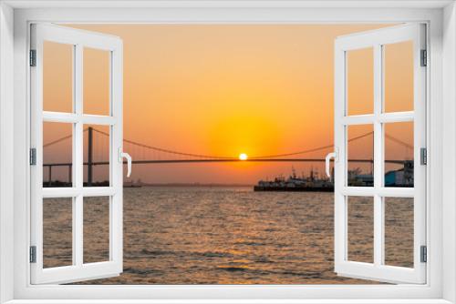 Fototapeta Naklejka Na Ścianę Okno 3D - Sunset with The Golden Bridge in Maputo, Mozambique