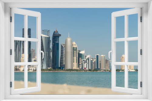 Fototapeta Naklejka Na Ścianę Okno 3D - View of city center with skyscrapers from the Beach in Doha, Qatar 