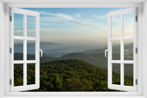 Panorama view of hills in nature with forest in Shenandoah at morning sunny day